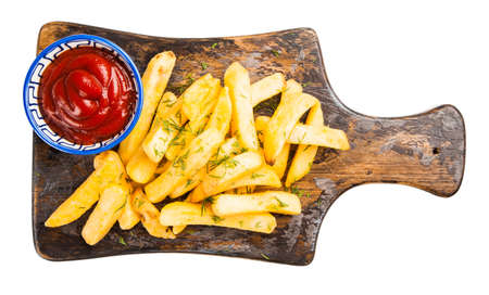 French fries on wooden table