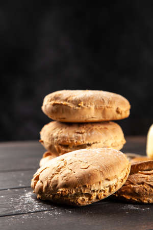 Homemade buns on dark background