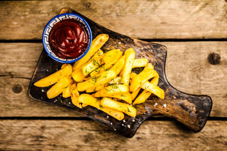 French fries on wooden tableの写真素材