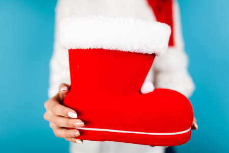 Woman holding Santas shoe