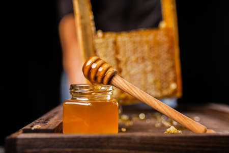 Honeycomb in a wooden frameの写真素材