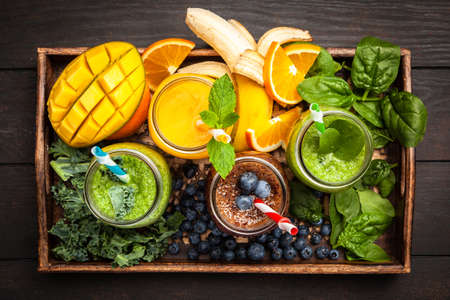 Assortment of green detox and fruit smoothiesの写真素材