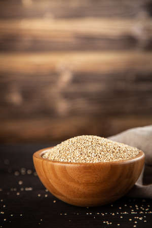 Raw quinoa seeds in a bowlの写真素材