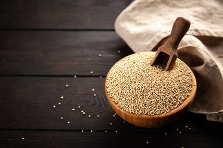 Raw quinoa seeds in a bowl close-upの写真素材