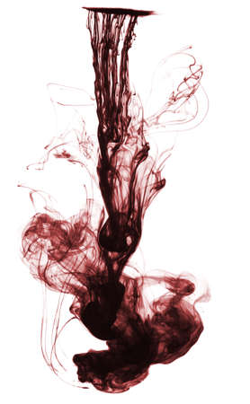 Ink floating in waterの写真素材