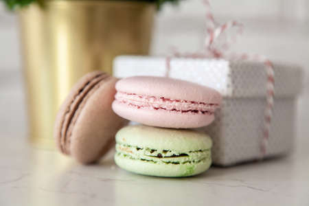 Macarons, gift boxes and flowers