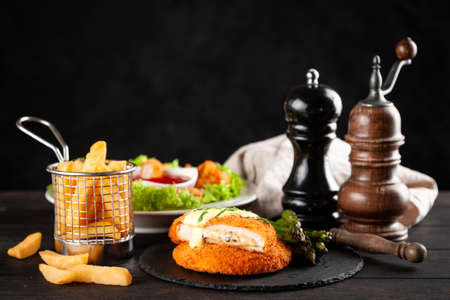 Cordon bleu, chicken nuggets and french friesの写真素材