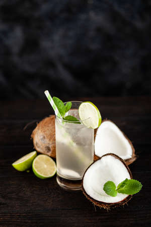 Coconut water drink on dark backgroundの写真素材