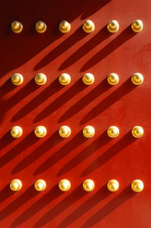 A traditional red door at ditan park in Beijing, China.
