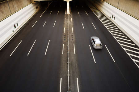 A car moving through the tunnelの写真素材