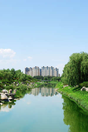 A calm brooklet and house.の写真素材