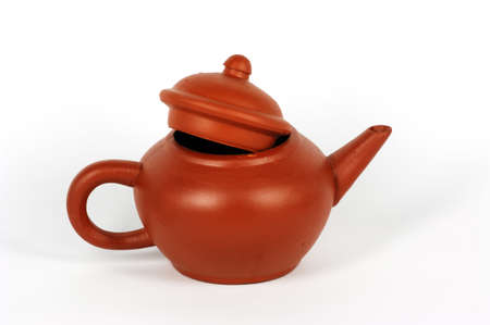 Red clay Chinese tea pot on white backgroundの写真素材