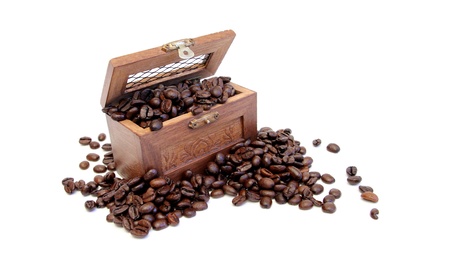 Little wood box filled with coffee beansの写真素材