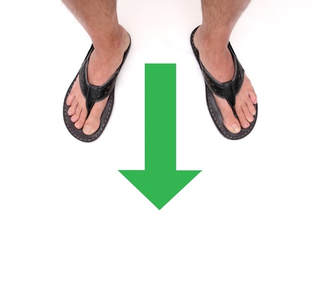 man feet with a green arrow on a white background