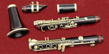 clarinet pieces over red carpet backgroundの写真素材