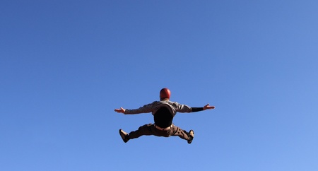 image of a skydiver flying in the sky