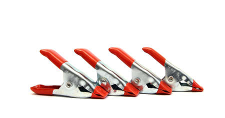 silver and red industrial spring clamps