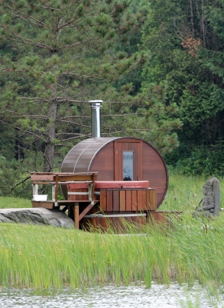 wooden sauna in the middle of the forestの写真素材