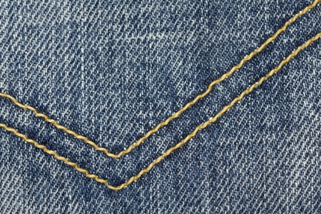 macro image of a blue jean pocket