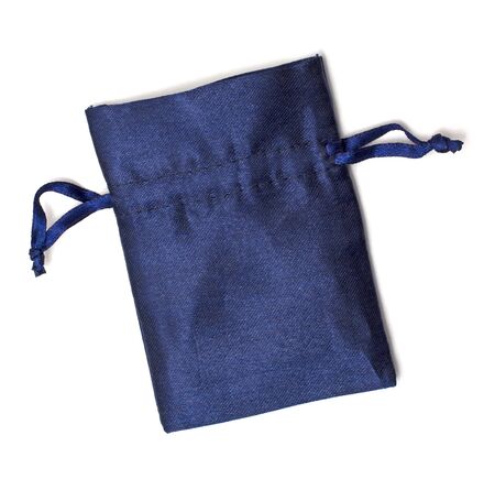 little blue satin pocket bag over whiteの写真素材