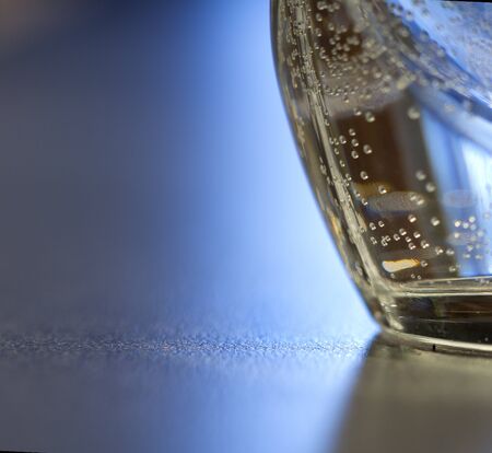 closeup of a glass of water on a barの写真素材