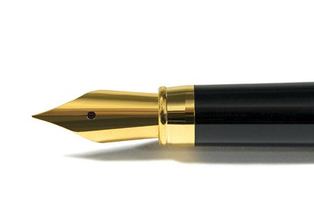 Golden fountain pen isolated on whiteの写真素材