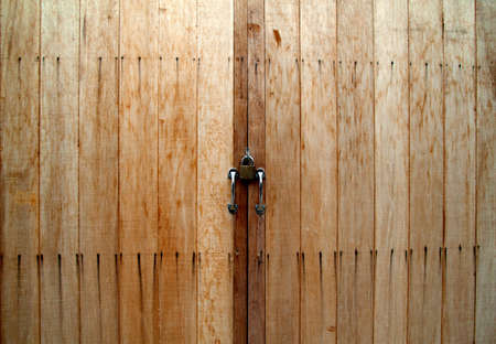 Wood door with lock の写真素材