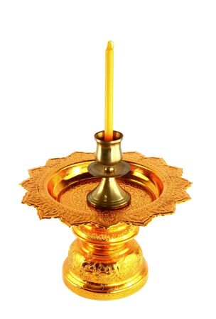 candle holder on golden tray isolated on whiteの写真素材