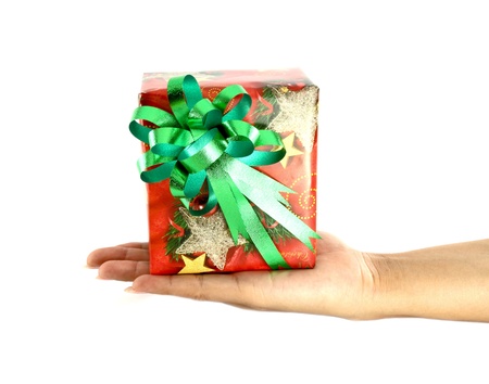 hand and gift over white backgroundの写真素材