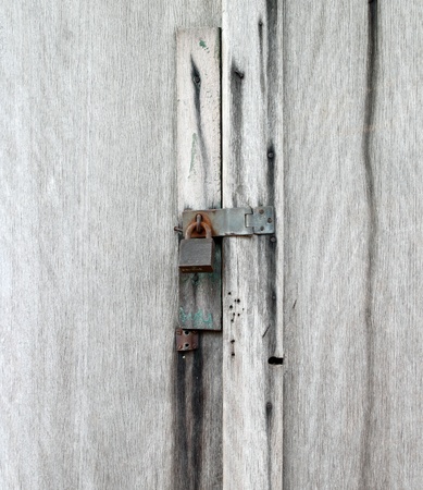 locked old wooden doorの写真素材