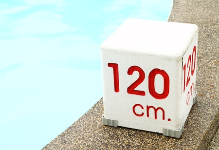 120 cm. water depth sign at swimming pool