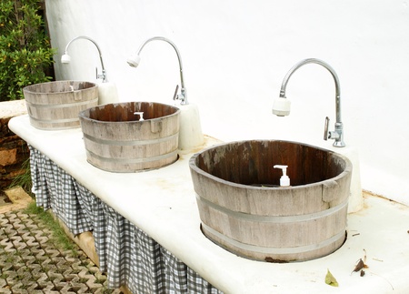 wood sinks and taps outdoorの写真素材