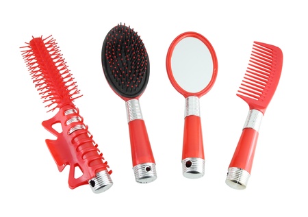 red hairbrushes set on  white background