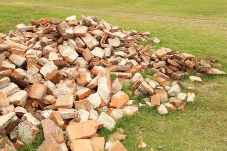Pile of demolished brick wall