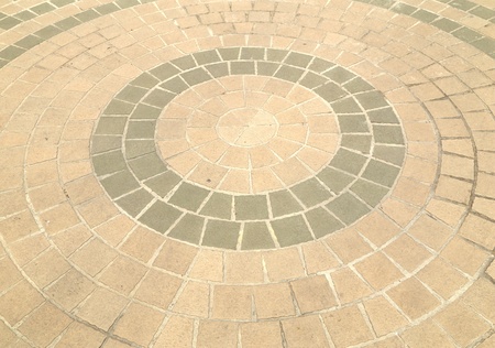 pavement of cobble stones in a circle patternの写真素材