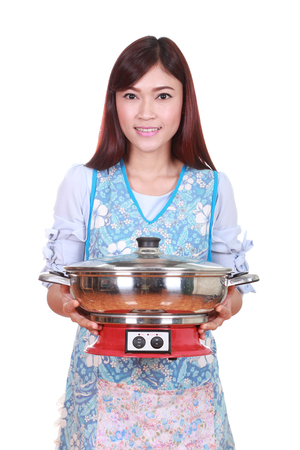 housewife with suki pot isolated on white backgroundの写真素材