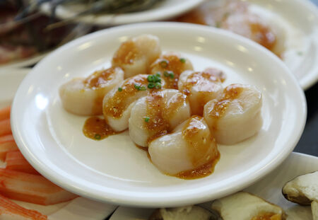Shellfish food with sauce in plate