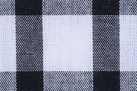 close up of gingham tablecloth fabric texture background