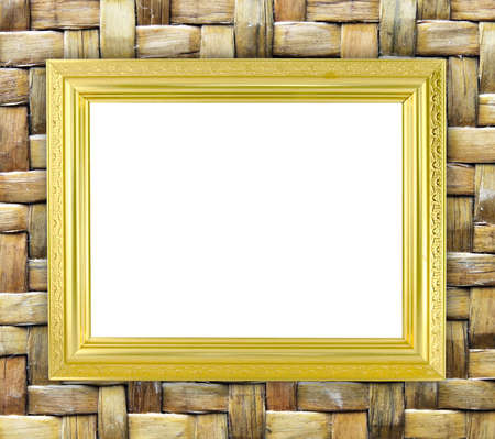 blank golden frame on bamboo texture backgroundの写真素材