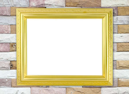 blank golden frame on brick stone wallの写真素材