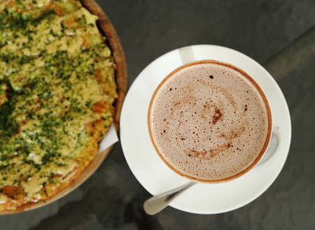 cup of hot chocolate with Pizza Japanese style in a cafeの写真素材