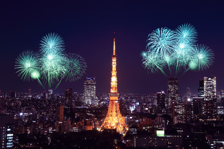 Fireworks celebrating over Tokyo cityscape at night, Japanの写真素材