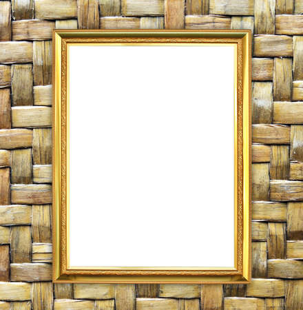 blank golden frame on bamboo texture backgroundの写真素材