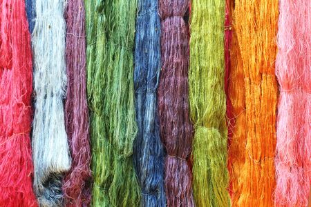 Colorful raw silk thread in the silk farmの写真素材