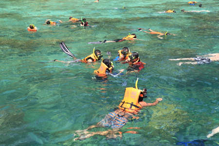 Krabi,Thailand-March 16,2015:Tourists enjoy with snorkeling in a tropical sea at Phi Phi island in Krabi, Thailandのeditorial素材