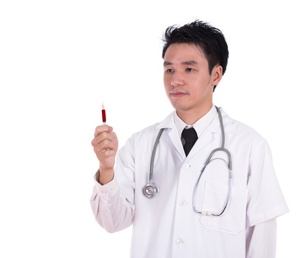 doctor holding syringe with blood isolated on white backgroundの写真素材