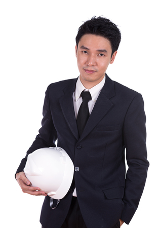 engineer in suit with helmet isoalted on white backgroundの写真素材