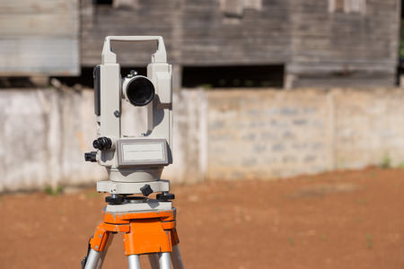 Surveyor equipment tacheometer or theodolite outdoors at construction siteの写真素材