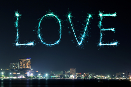 Love sparkle Fireworks celebrating Pattaya beach at night, Thailandの写真素材