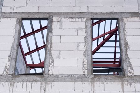 window and white Lightweight Concrete wall of New Home at construction siteの写真素材